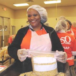 Woman volunteers at Forgotten Harvest